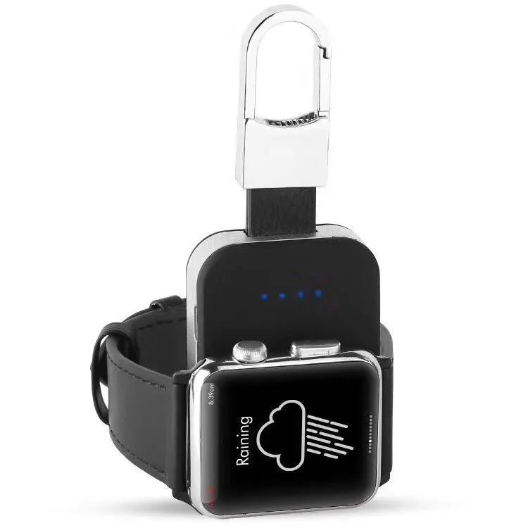 Black portable wireless power bank charger for Apple Watch on a keychain.