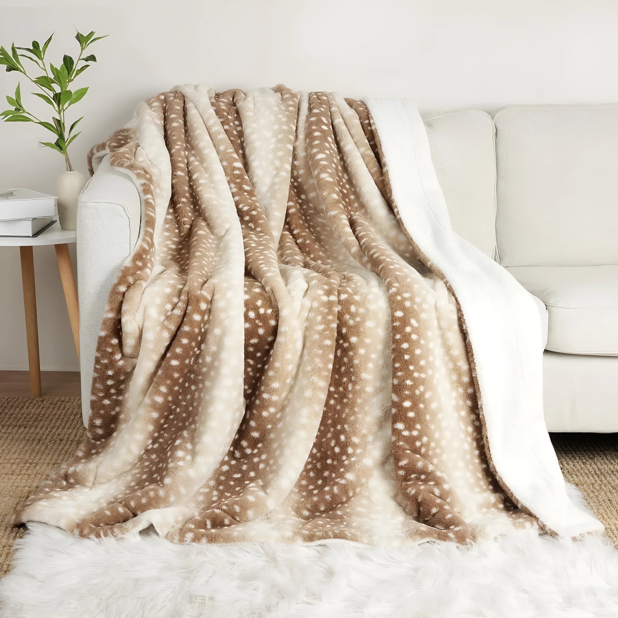 White flannel blanket with animal stripe pattern on a sofa