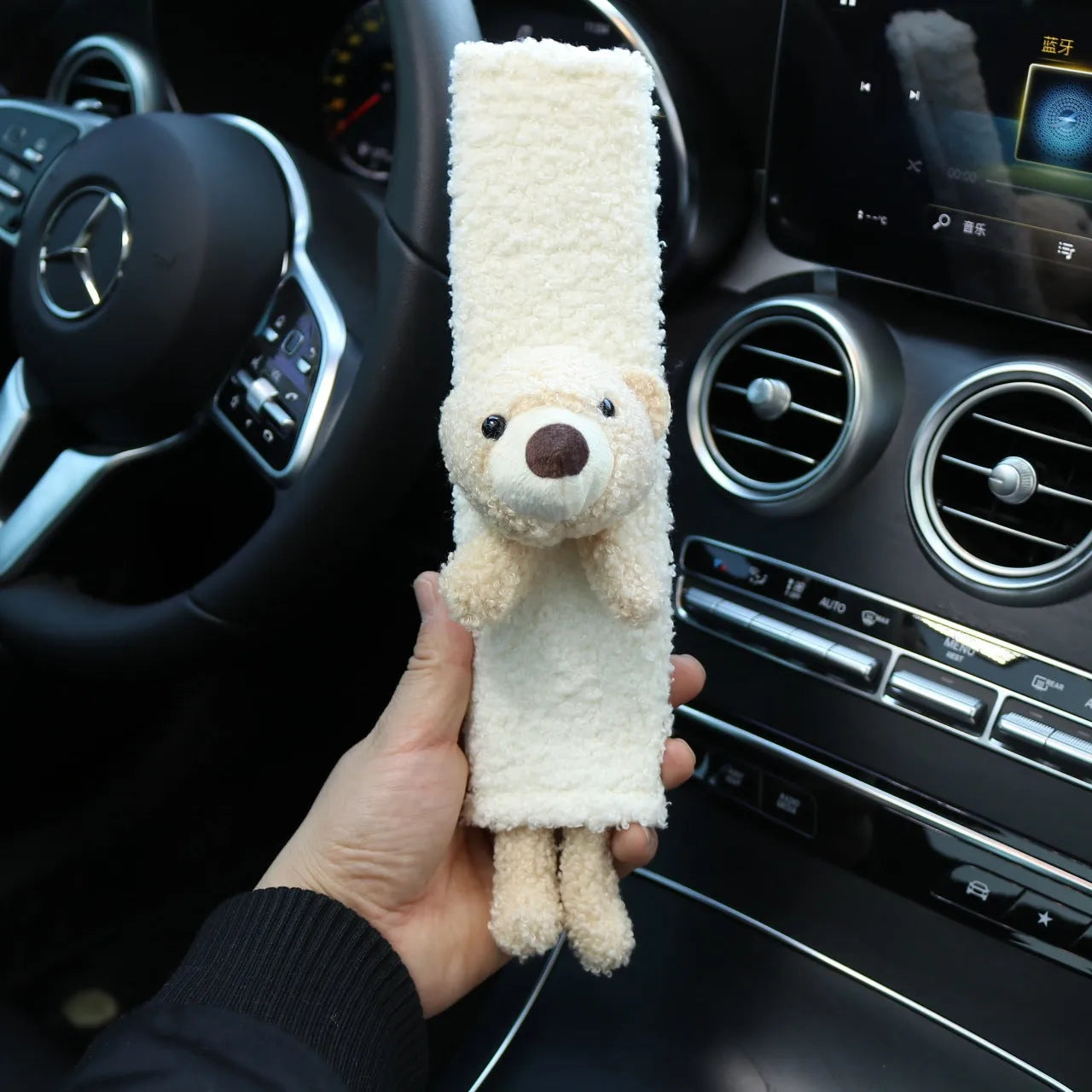 Cartoon plush car seat belt shoulder protector in lamb wool, showing rabbit and bear designs.