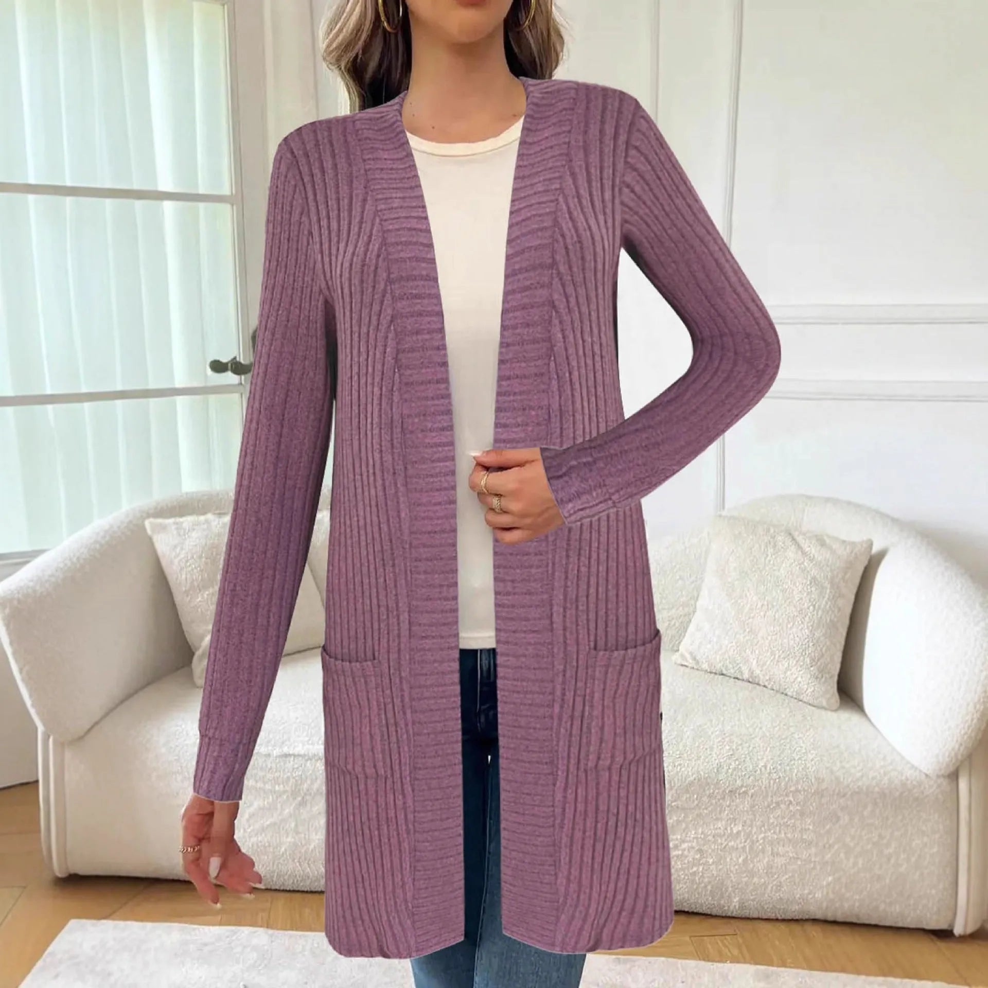 Long sleeve loose fit cardigan jacket with pockets in polyester fabric shown in black colour