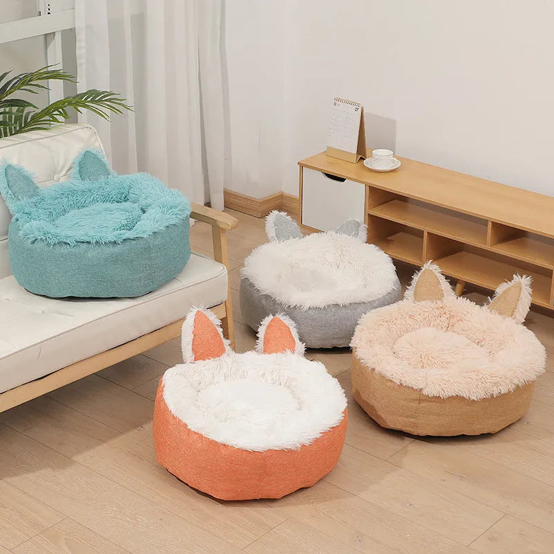 Soft faux fur plush cat bed in grey with fluffy interior – available in multiple sizes and colours for indoor use
