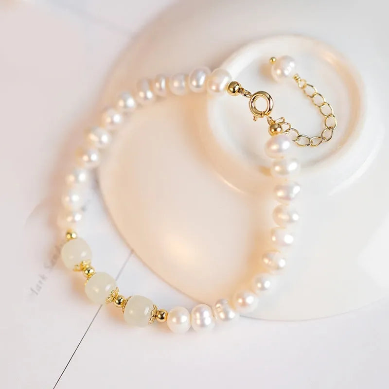 Korean style freshwater pearl bracelet in diamond shape, showing deep Hetian jade colour variant.
