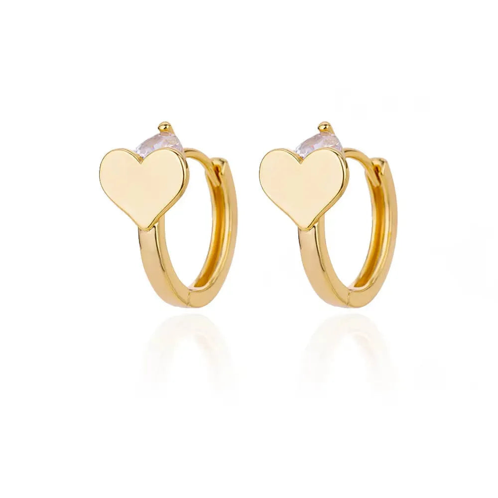 Pair of heart-shaped stainless steel stud earrings with zircon stones and ear clip fittings.