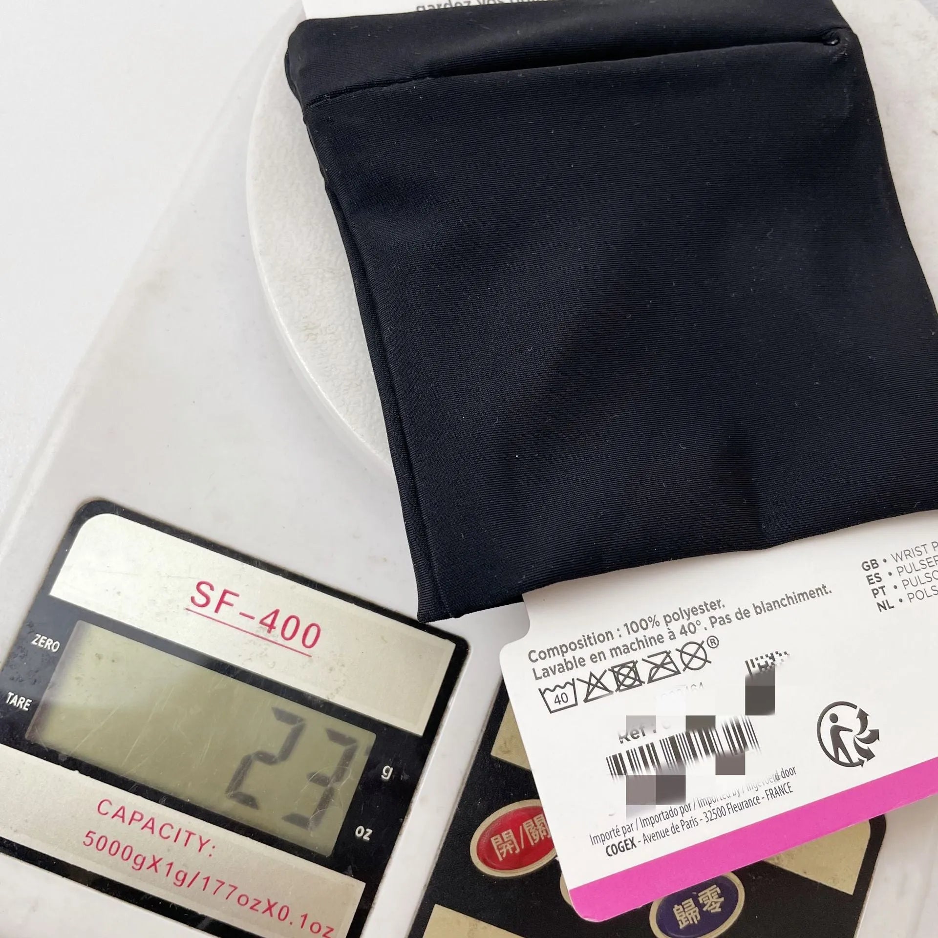Wrist bag armband sleeve for mobile phone, showing 10x10.5cm dimensions and zipped closure.