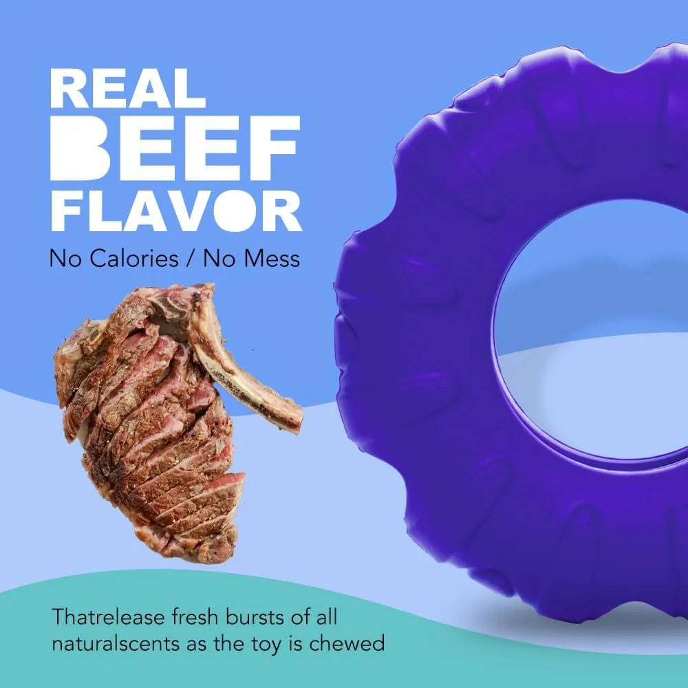 Blue rubber tyre-shaped dog chew toy with oval openings, shown as a slow feeder and interactive puzzle toy