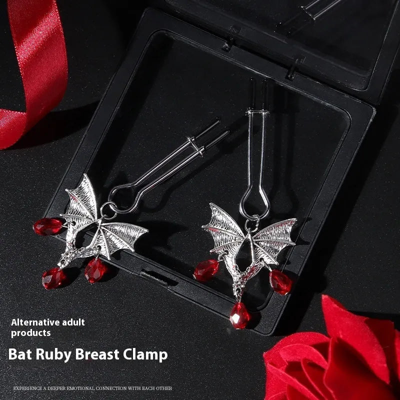 Silver alloy diamond bat nipple clamp with adjustable pressure and ruby bat decorative design