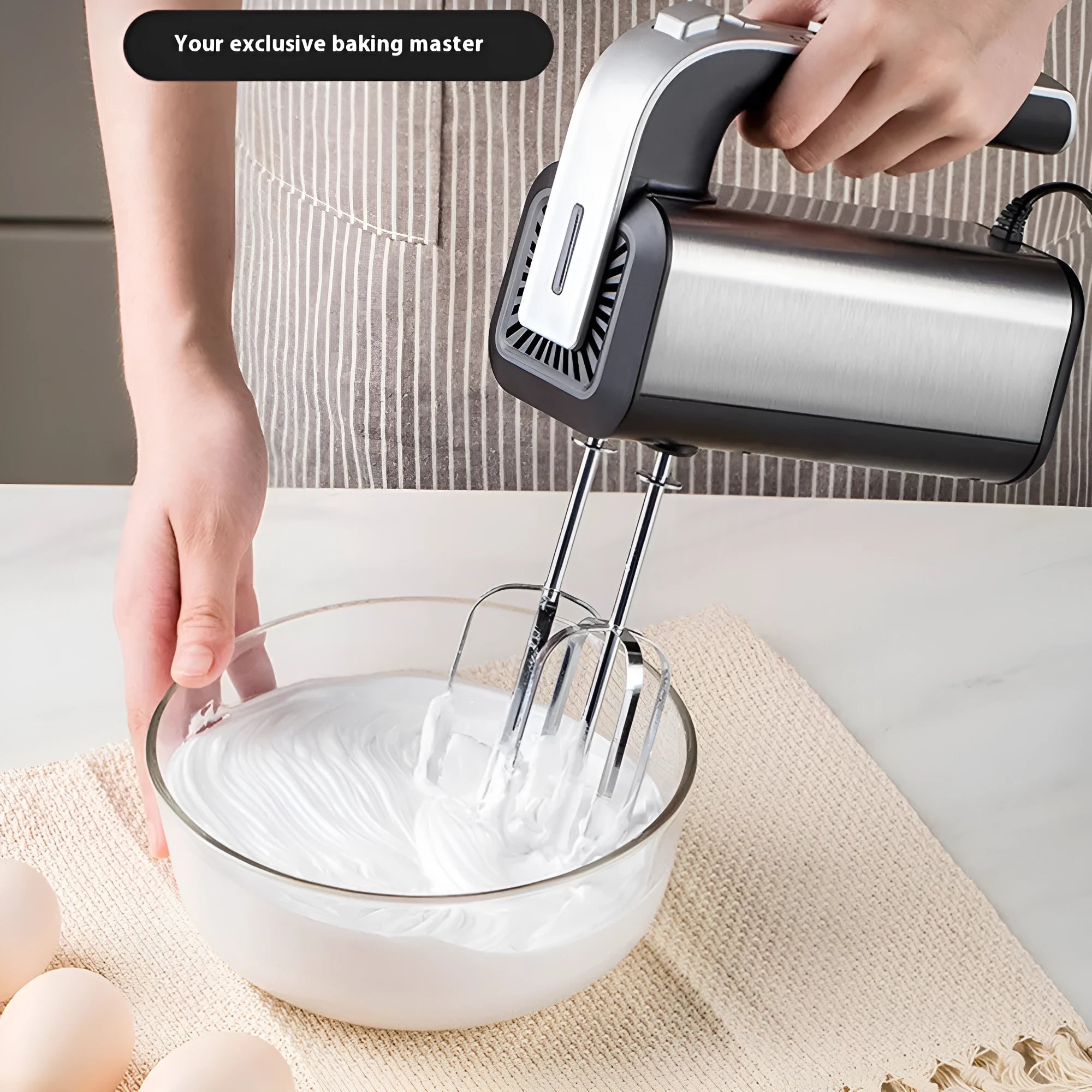Silver handheld electric whisk with five-speed settings for kitchen mixing tasks