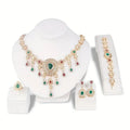 Gold alloy 4-piece jewellery set with bubble and sphere design – earrings, necklace, ring, and bracelet