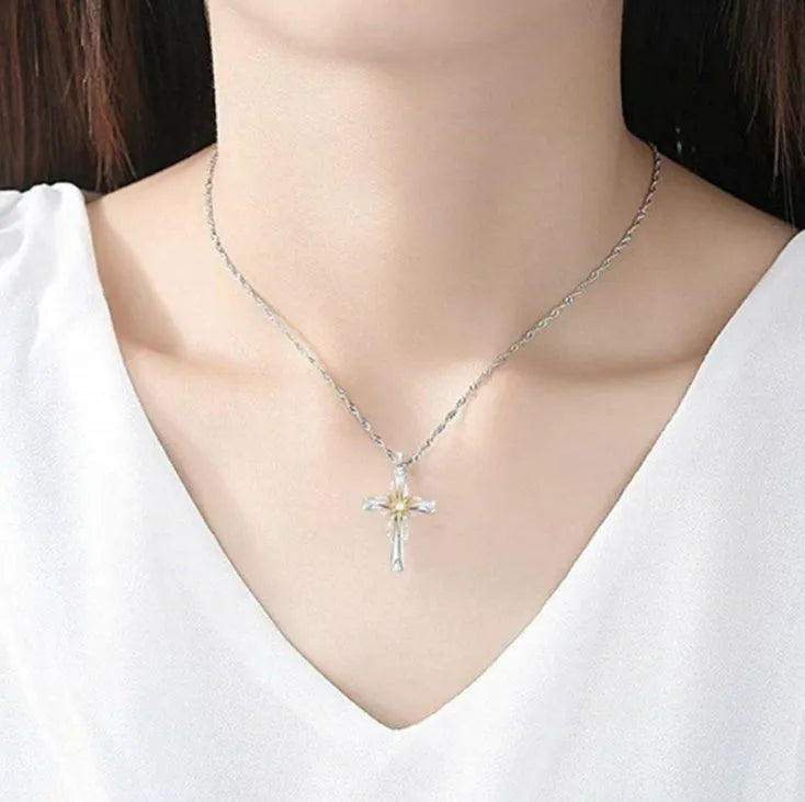 Silver alloy cross pendant with octagonal star detail on ring chain, 22x15mm size
