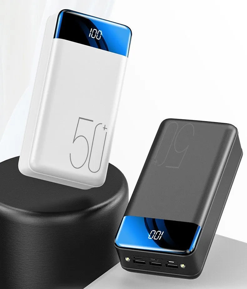 Black and white large capacity 50000mAh power bank with three USB output ports.
