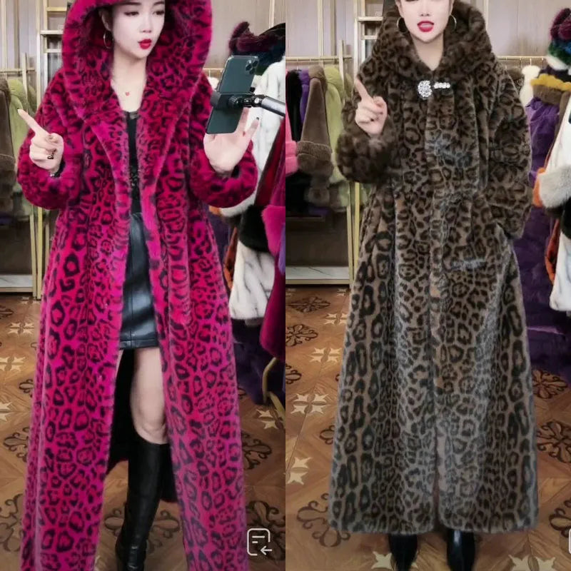 Long brown leopard print faux fur coat on a hanger, showing its loose fit and regular sleeves.