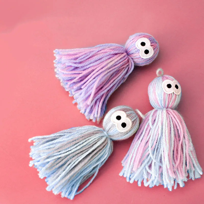 Cat toy set with wool ball, hanging attachment, and teaser stick in blue-gray colour combination