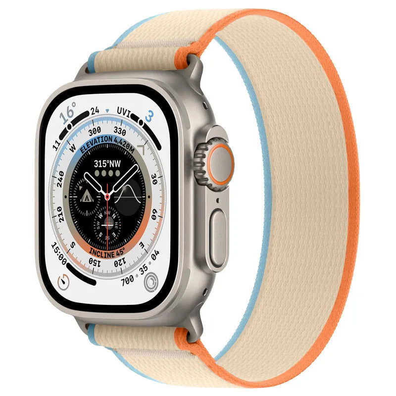 Nylon single ring strap Apple Watch band in multiple colours on a grey background.