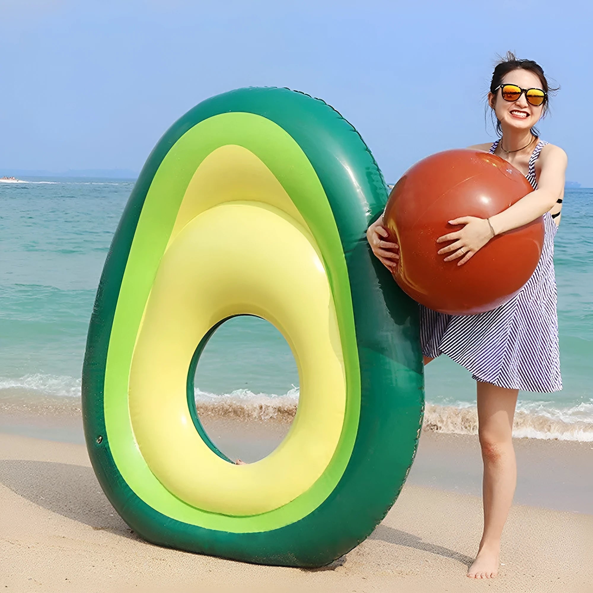 Green giant avocado-shaped inflatable pool float on water