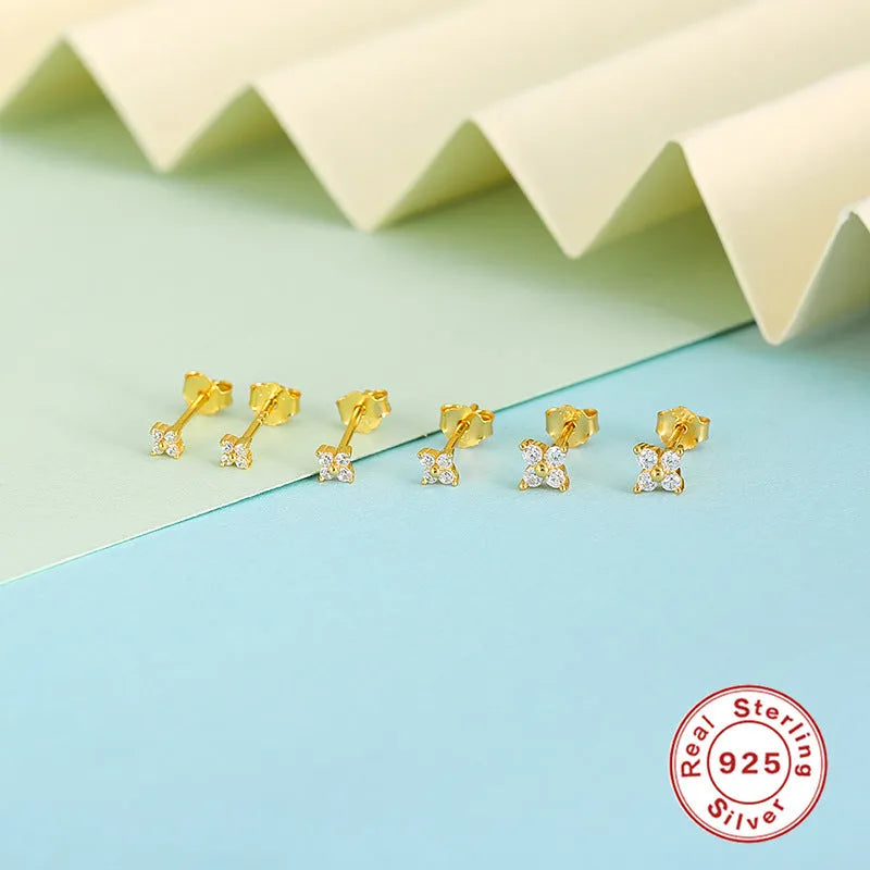 S925 sterling silver stud earrings with a petal-shaped crystal flower design in gold or platinum plating.