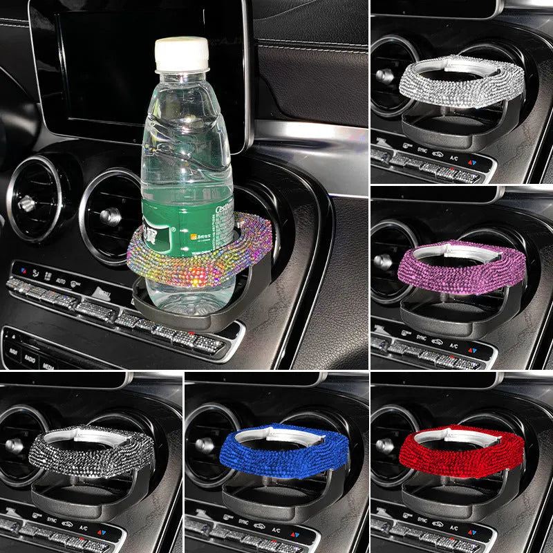 White diamond decorated car cup holder bracket mounted on a vehicle air vent.