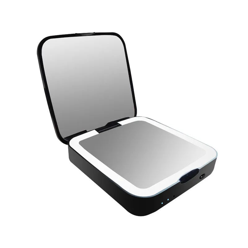 Black and white makeup mirror with dual reflection surfaces and adjustable lighting controls