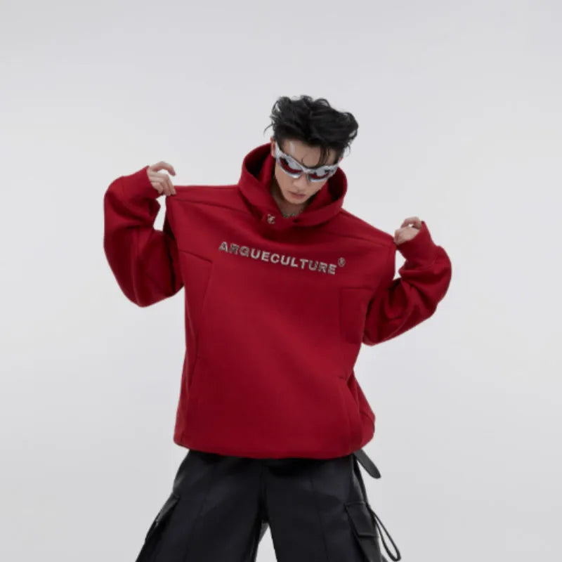 Men's red loose hoodie with metal printed heavy shoulder pads and a zip-up hood.