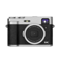 Black 5K HD digital camera with dual lenses and an optical viewfinder on a 2.88-inch screen.