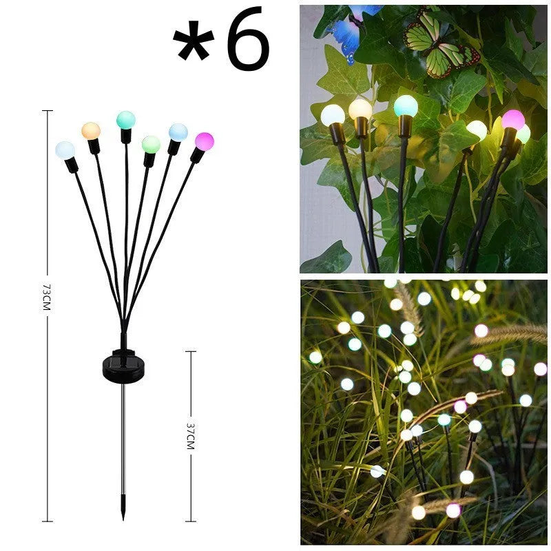 Solar-powered LED garden light with multiple heads on stainless steel ground spikes