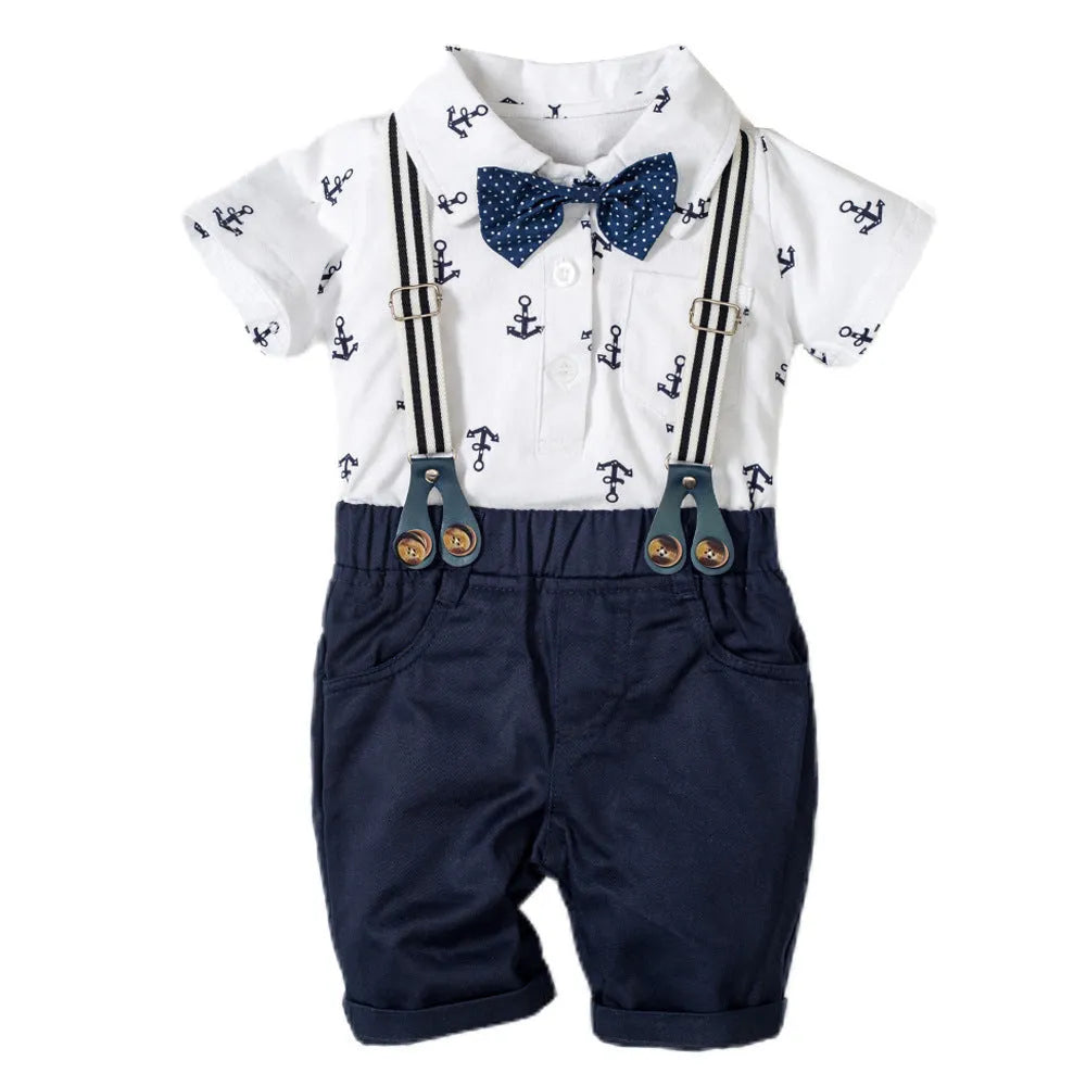 Blue cotton baby boy romper with gentleman print and short sleeves.