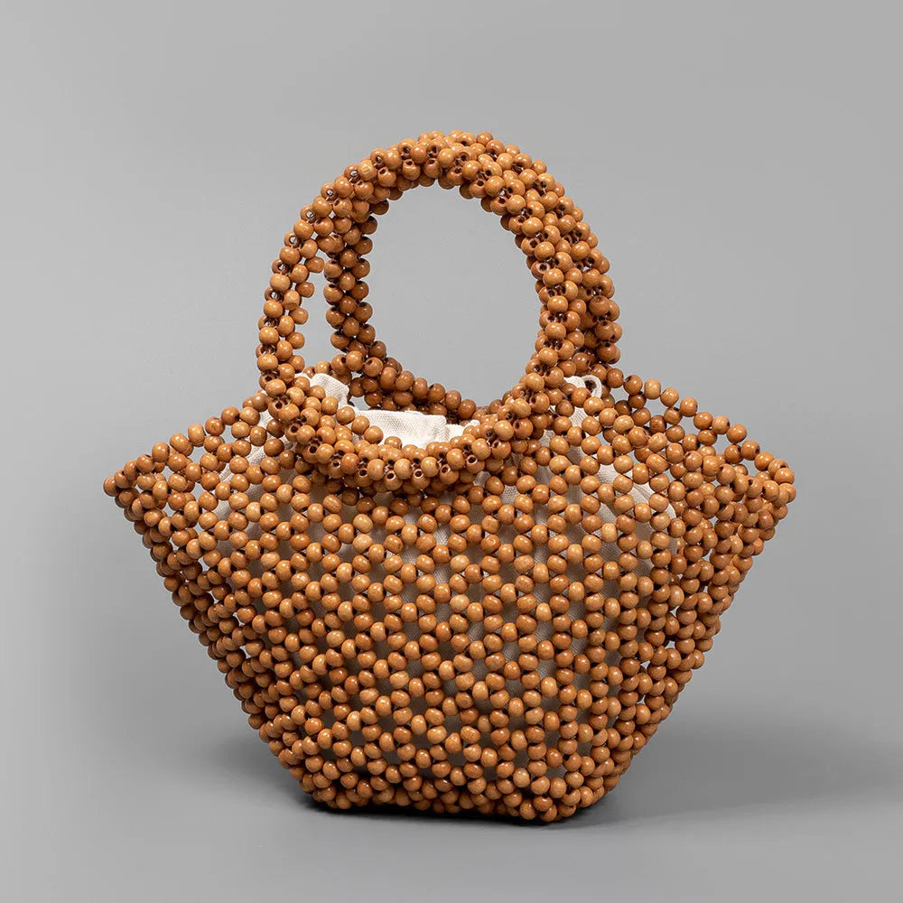 Maple wood hand-woven seaside handbag with wooden beads in dumpling shape