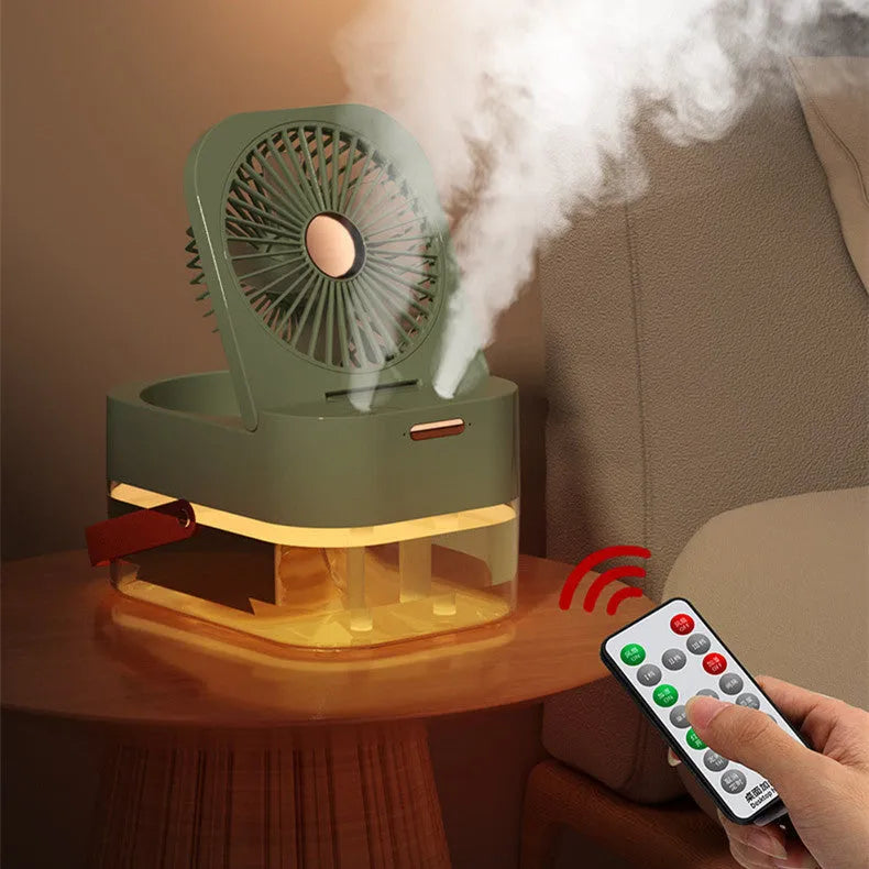 Pearl white portable USB desk fan with humidifier mist and soft night light on a wooden desk.