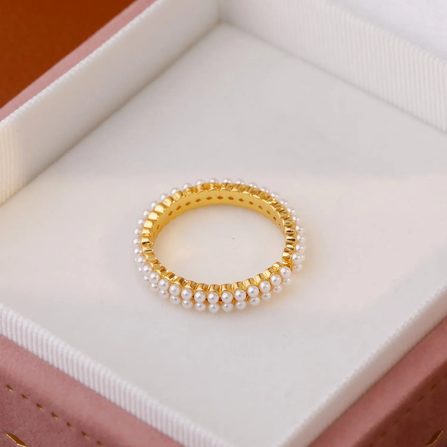 Geometric gold electroplated women's ring with open mouth design and round pearl element