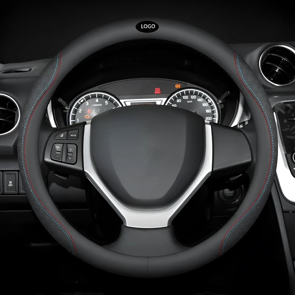 Black leather steering wheel cover with coloured stitching, shown fitted on a car wheel.