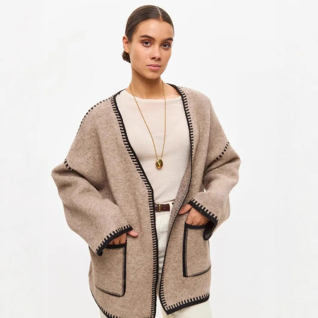 Loose fit lace-up front knitted cardigan in black, camel, or white colours.