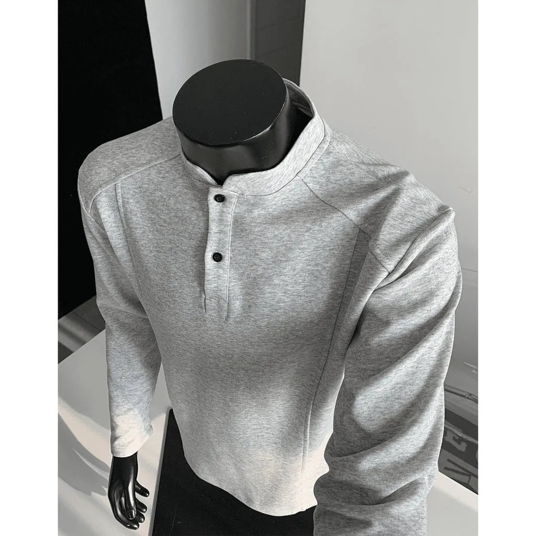 Men's loose-fitting asymmetric patchwork polo shirt with a stand-up collar and long sleeves in grey.