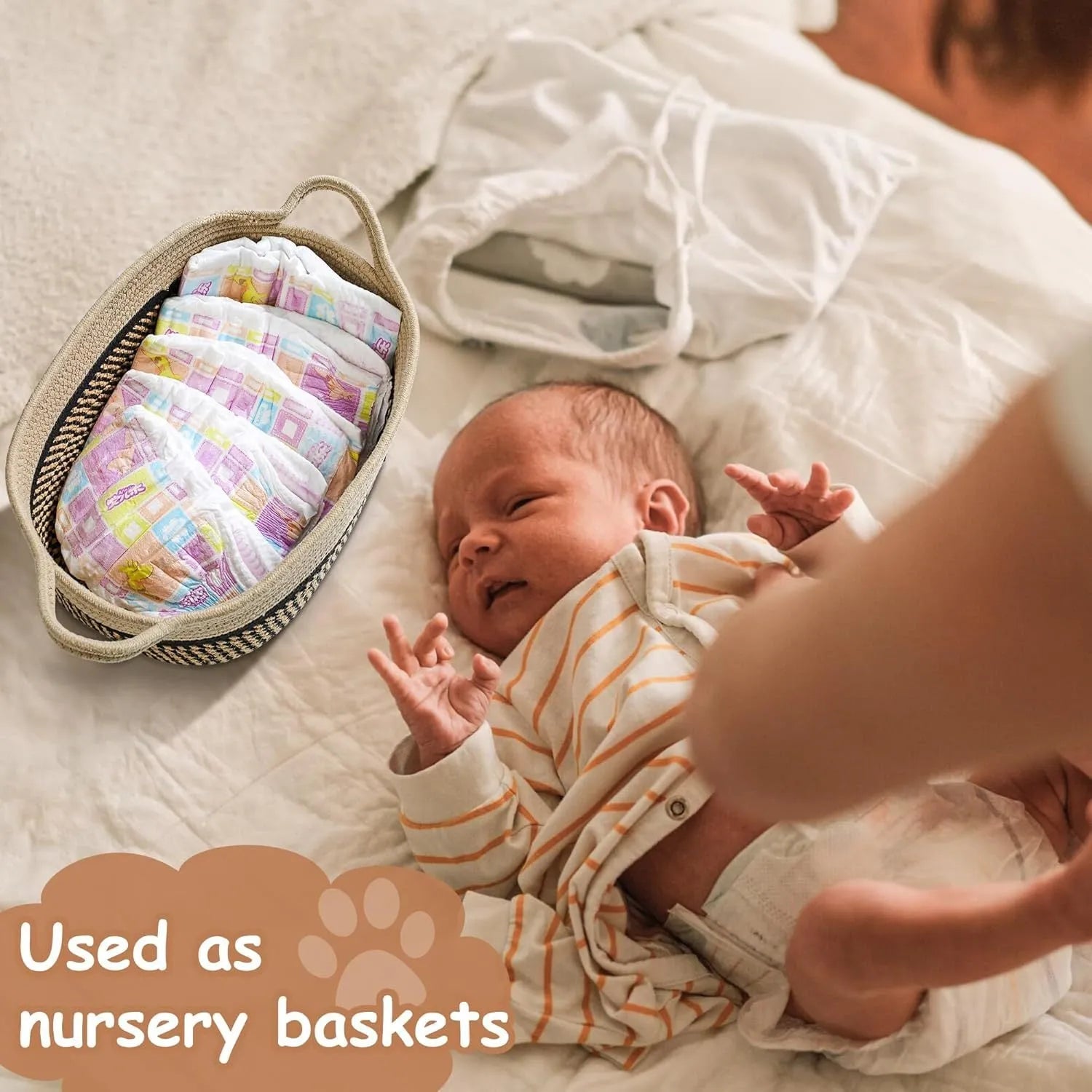 Handmade woven light beige cotton rope storage basket with wooden handles showing 34x26x15cm dimensions
