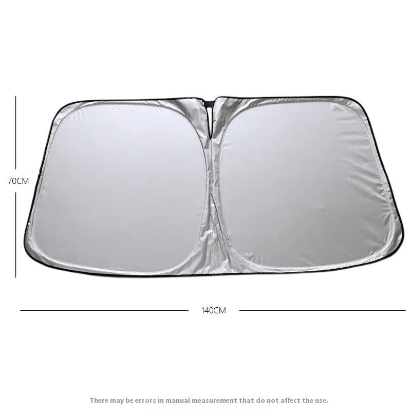 Aluminium foil car sunshade in titanium silver colour, folded flat.