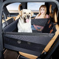 Grey water resistant dog bed with raised edges, measuring 56x56x40 cm.