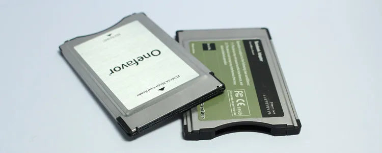 SD to PCMCIA adapter card with stainless steel housing and inserted 32GB SD card for Mercedes-Benz cars.