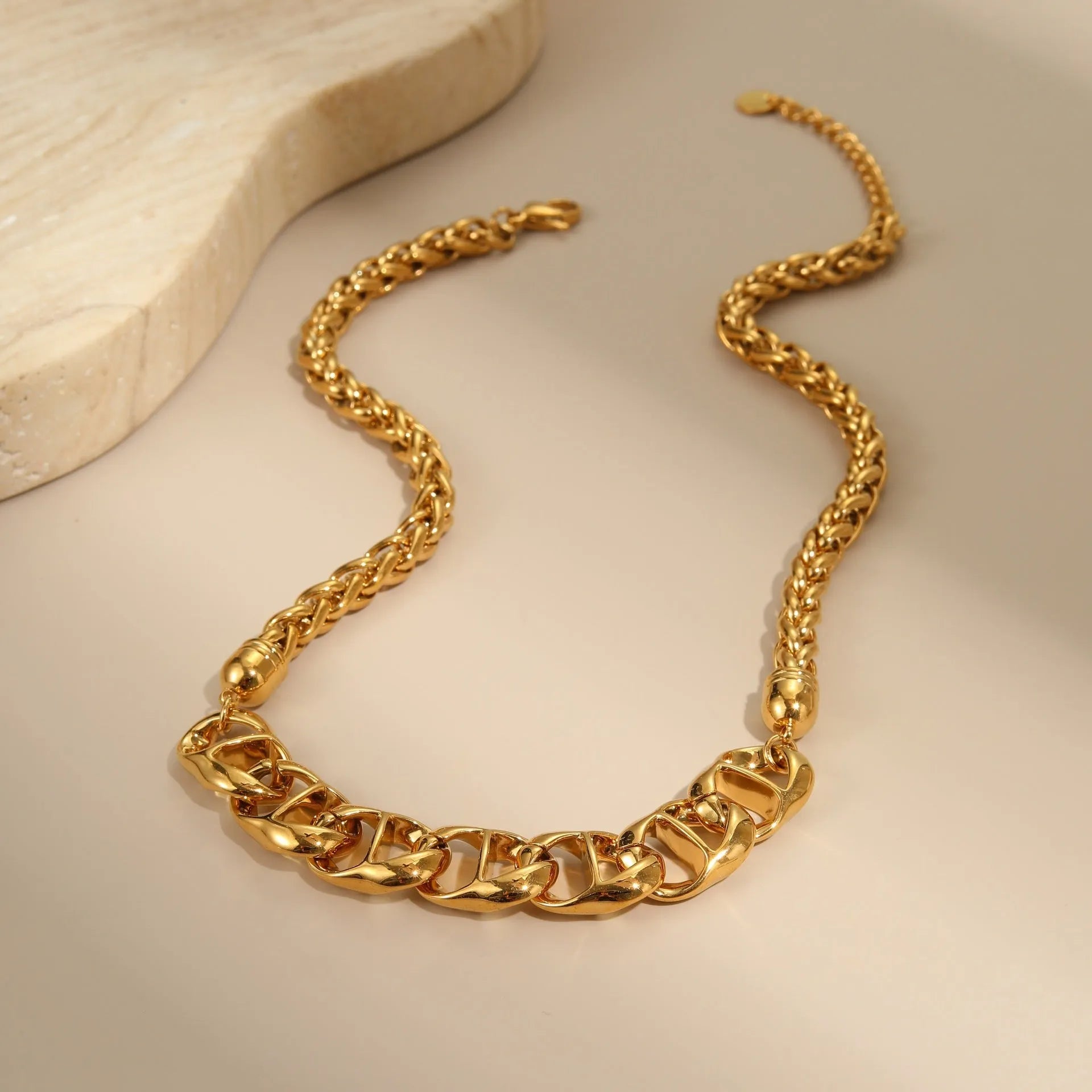 Stainless steel necklace with geometric pendant and 18K gold plating in gold or steel colour options