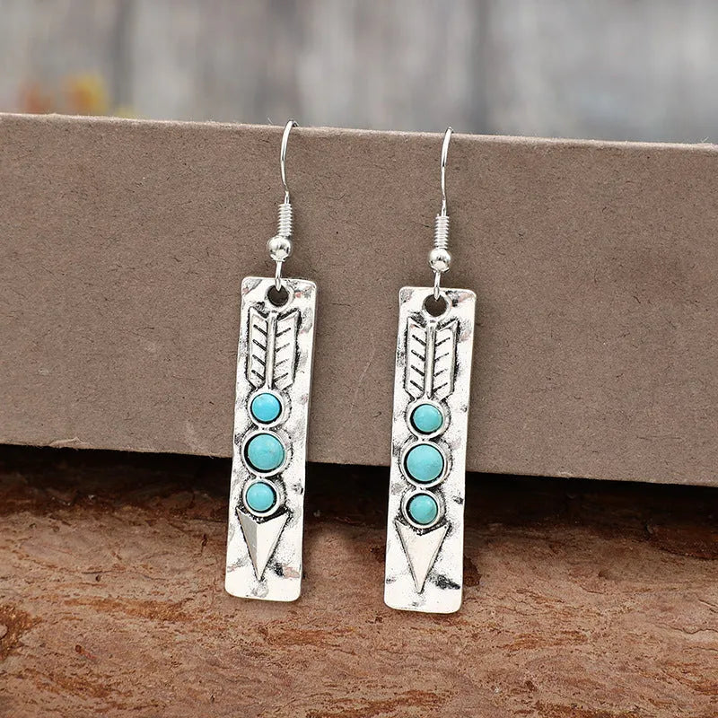 Silver geometric retro earrings with turquoise inlay on long strip zinc alloy design