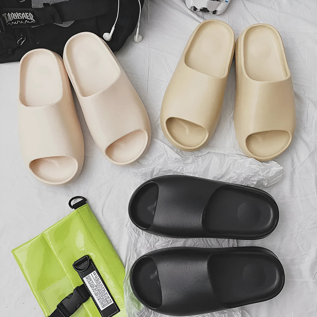 Women's thick sole beach slippers in beige, black, brown, and green colours showing EVA construction and youth fashion style