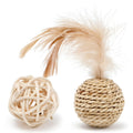 Two cat toys: a brown woven rattan ball and a multicoloured faux feather ball with a bell on a white background.