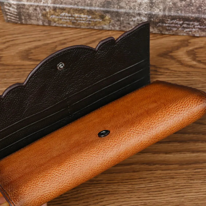 Chinese style embossed tri-fold leather wallet in retro brown colour showing floral pattern