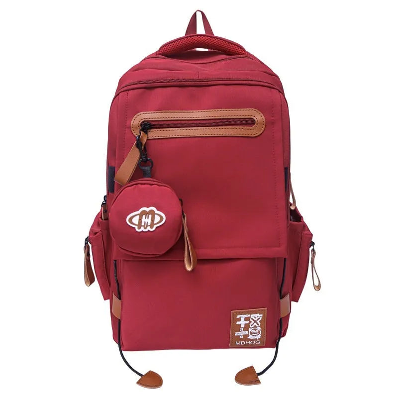 Japanese leisure travel backpack in black with contrast stitching and 20-35 litre capacity