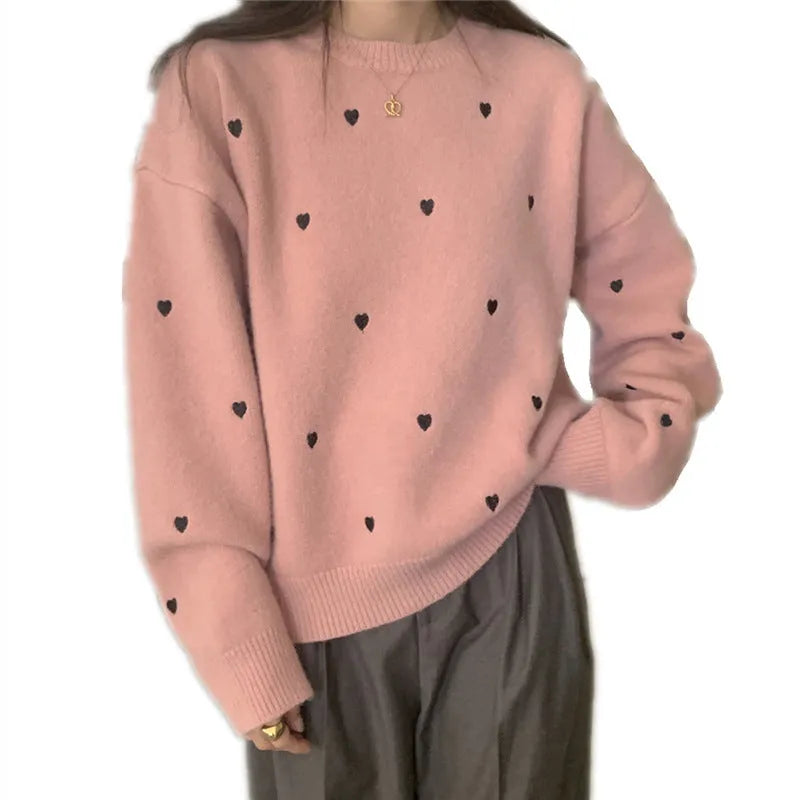 Women's loose grey acrylic pullover sweater with love-pattern embroidery on the front.