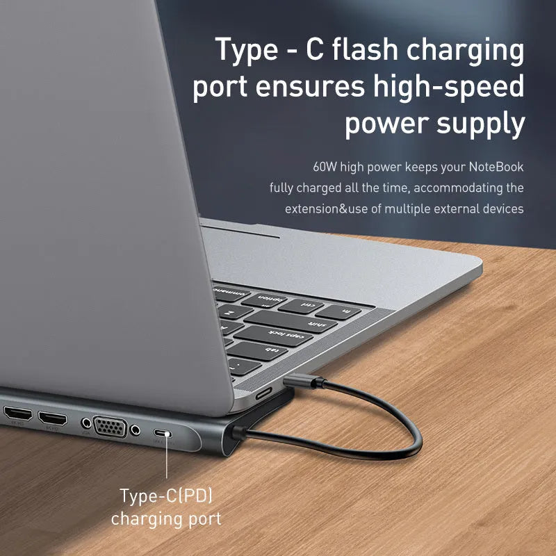 Grey aluminium ten-port docking station with cooling bracket showing HDMI, VGA, USB and network ports