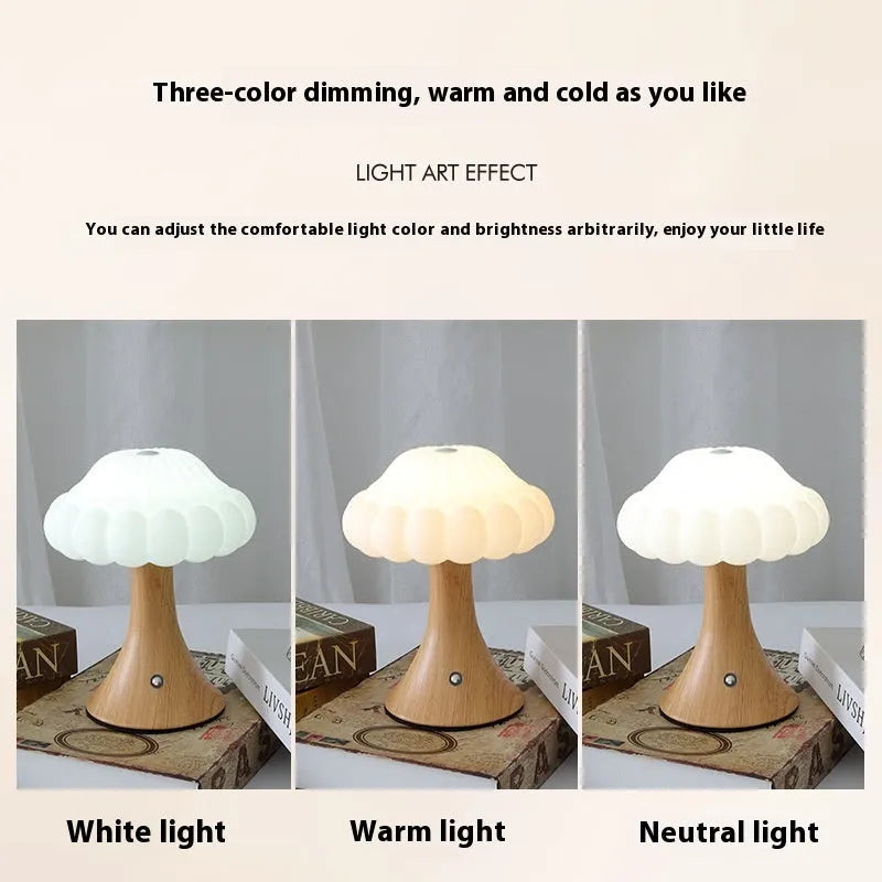 Small mushroom-shaped night lamp on a charging base in wood grain colour finish.