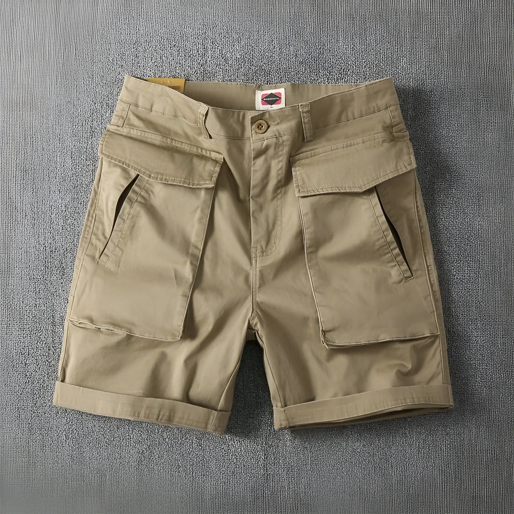 Men's straight-leg cotton cargo shorts with stretch in multiple colour options on a size chart.
