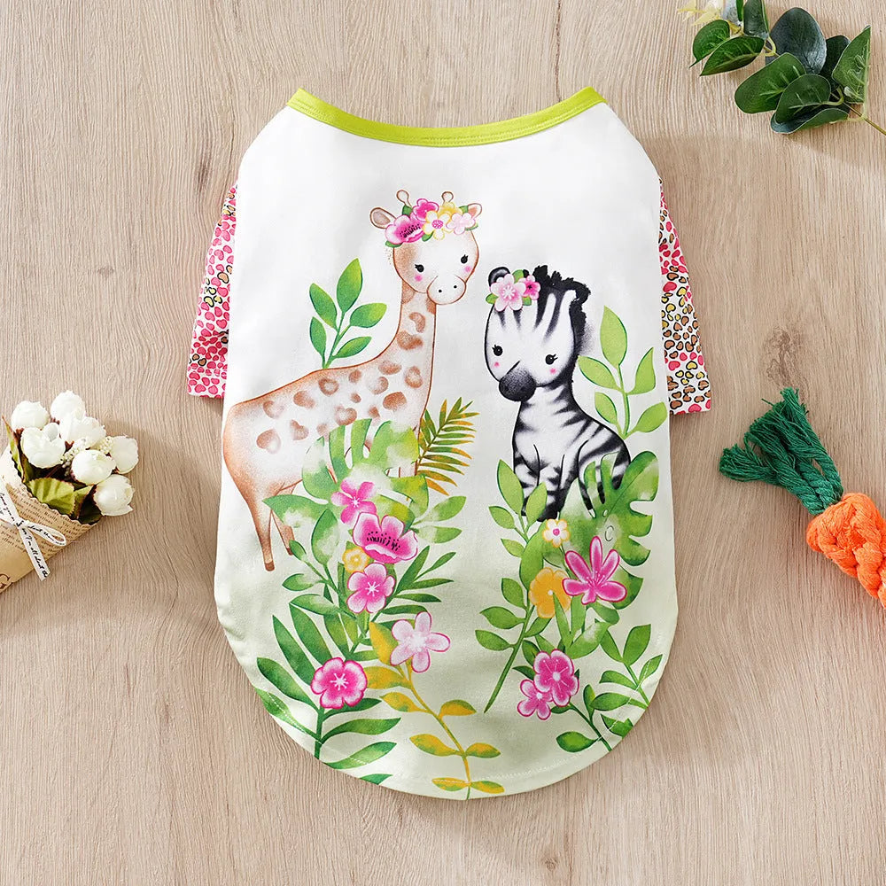 Colourful printed polyester t-shirt on a small dog, showing the casual fit and design.