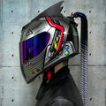 Dirty Braids full-face motorcycle helmet with graphic design options on an ABS shell.