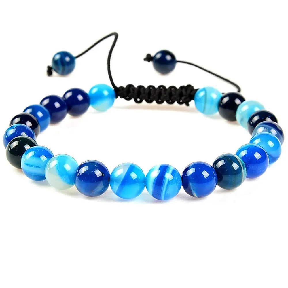 Women's aquamarine flat knot braided healing bracelet with hand-woven geometric texture