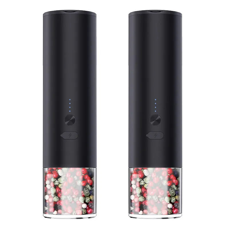 White electric pepper and salt grinder with stainless steel top and clear glass jar showing LED lights