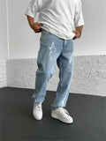 Men's blue straight-leg denim jeans with wide-leg fit and medium elasticity